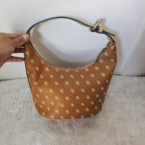 Dooney & Bourke Handbags - Dooney and Bourke Bucket Bag. IT39C Tan.